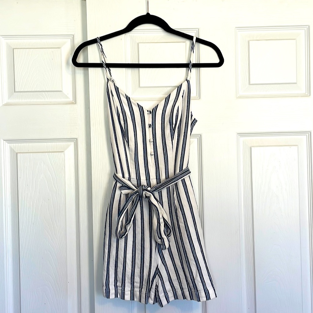 Size 2 Guess white and blue striped romper. Used, like new